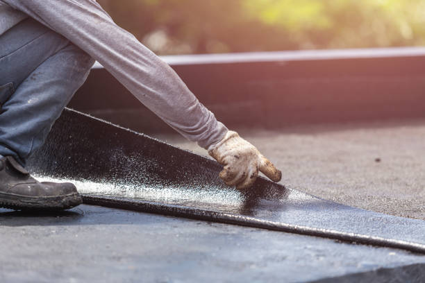 Professional Waterproofing technician working in Dumont, NJ